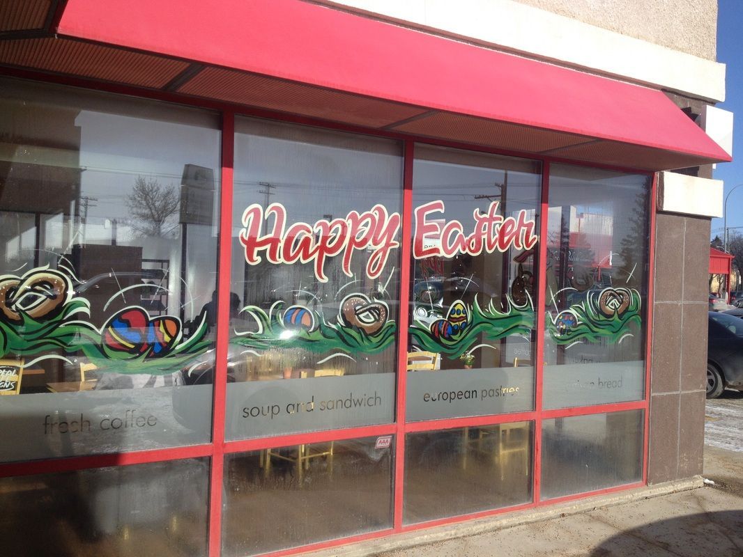 A store front with a sign that says happy easter