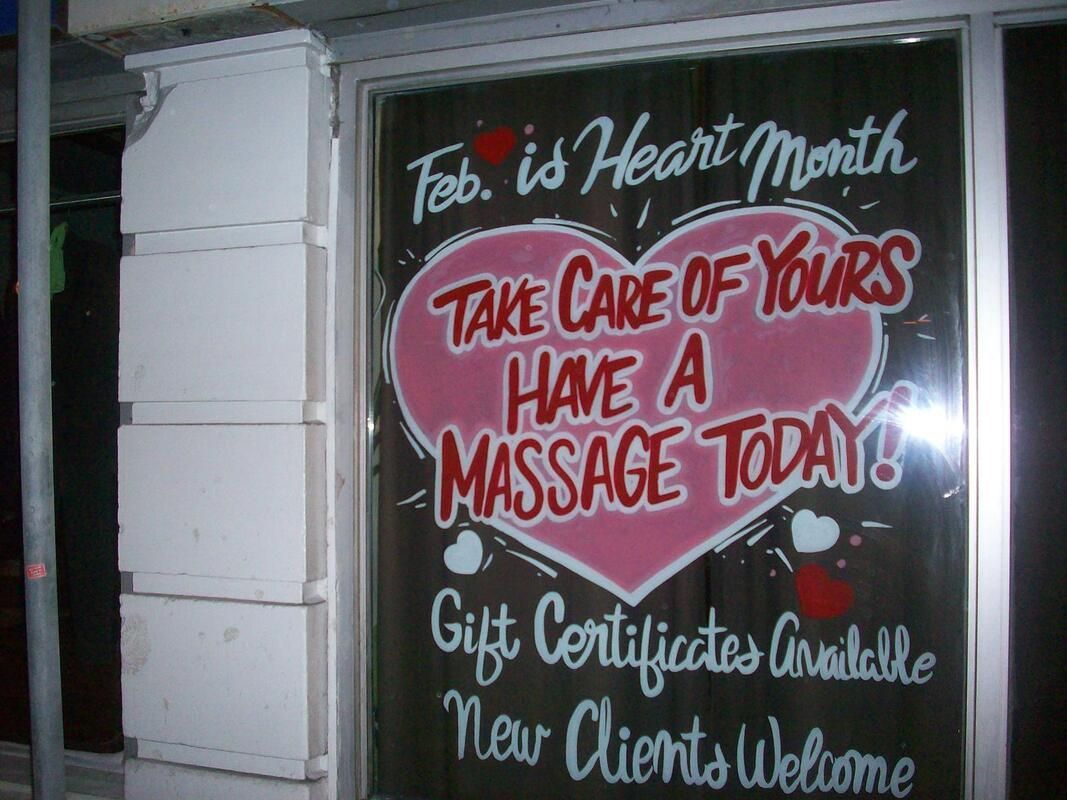 A sign that says february is heart month