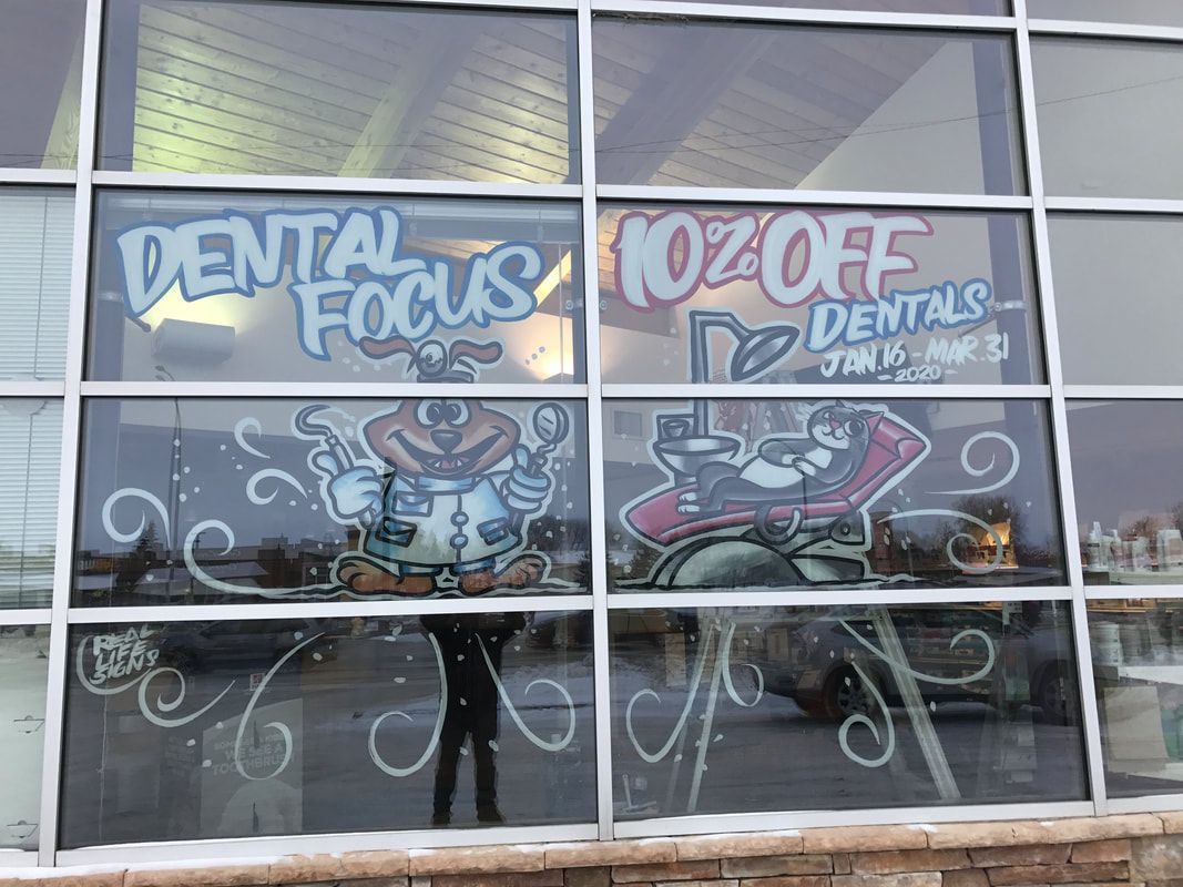 A window with a drawing of a dentist and the words dental focus on it.