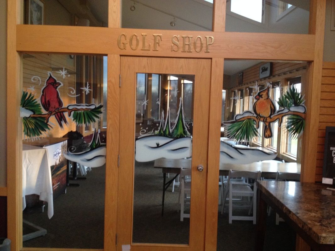 A golf shop with tables and chairs inside