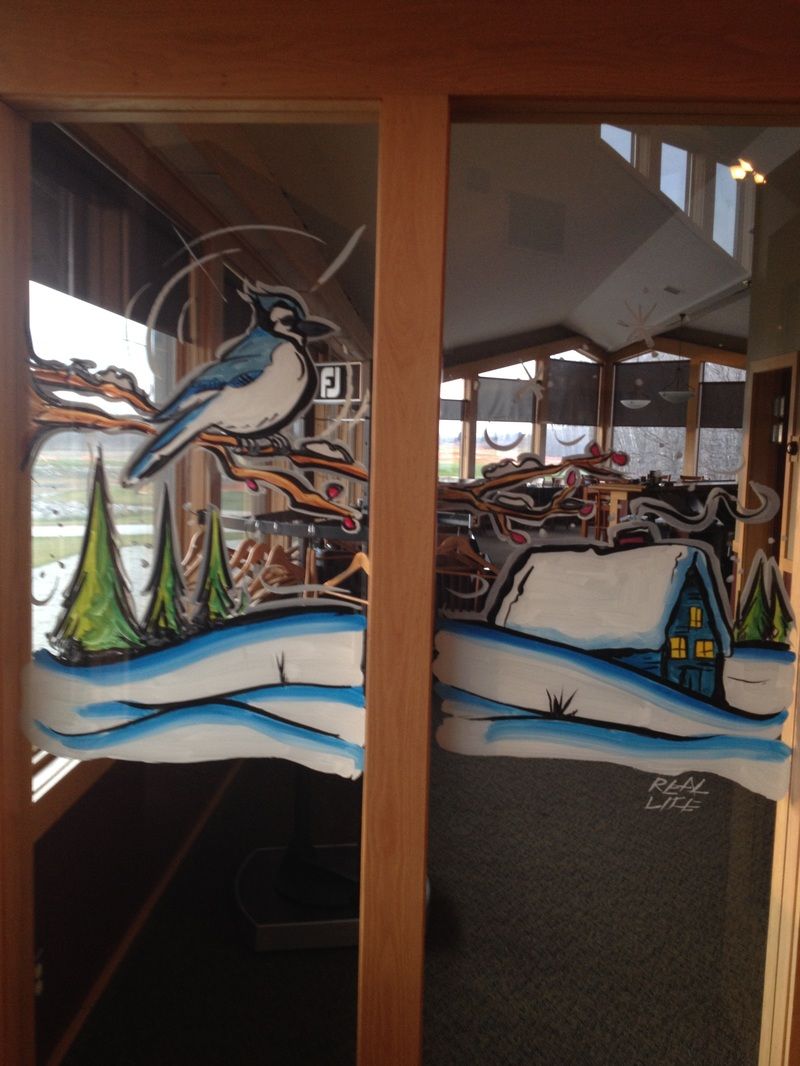 A painting of a bird sitting on a branch in the snow