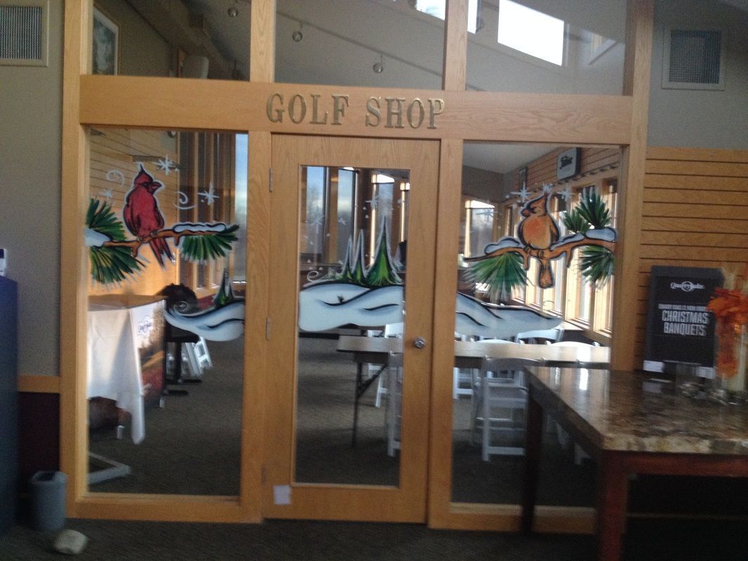 A golf shop with a large glass door