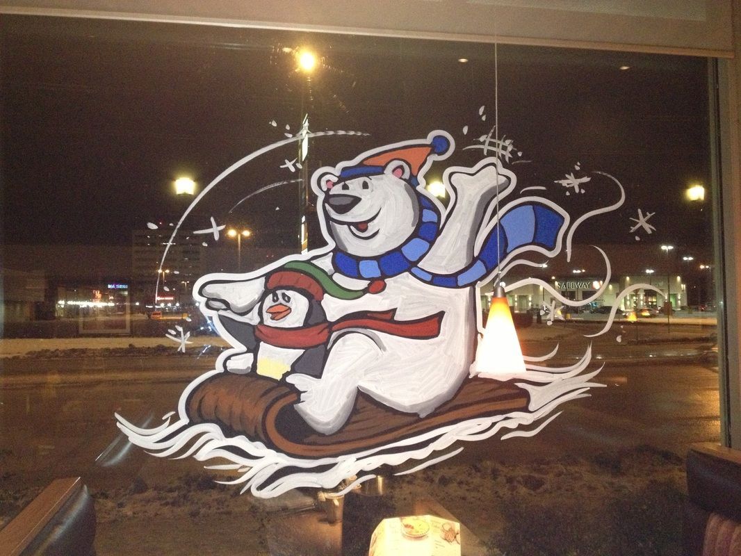 A drawing of a polar bear on a sled