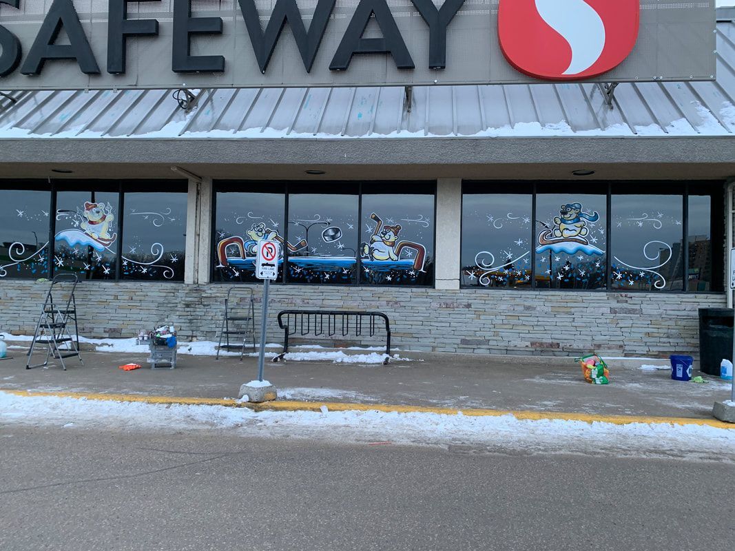 The outside of a safeway store with snow on the ground
