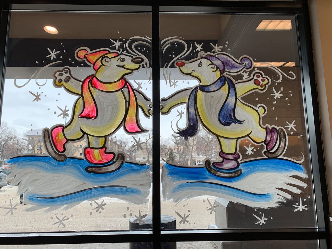 Two polar bears are ice skating on a window.