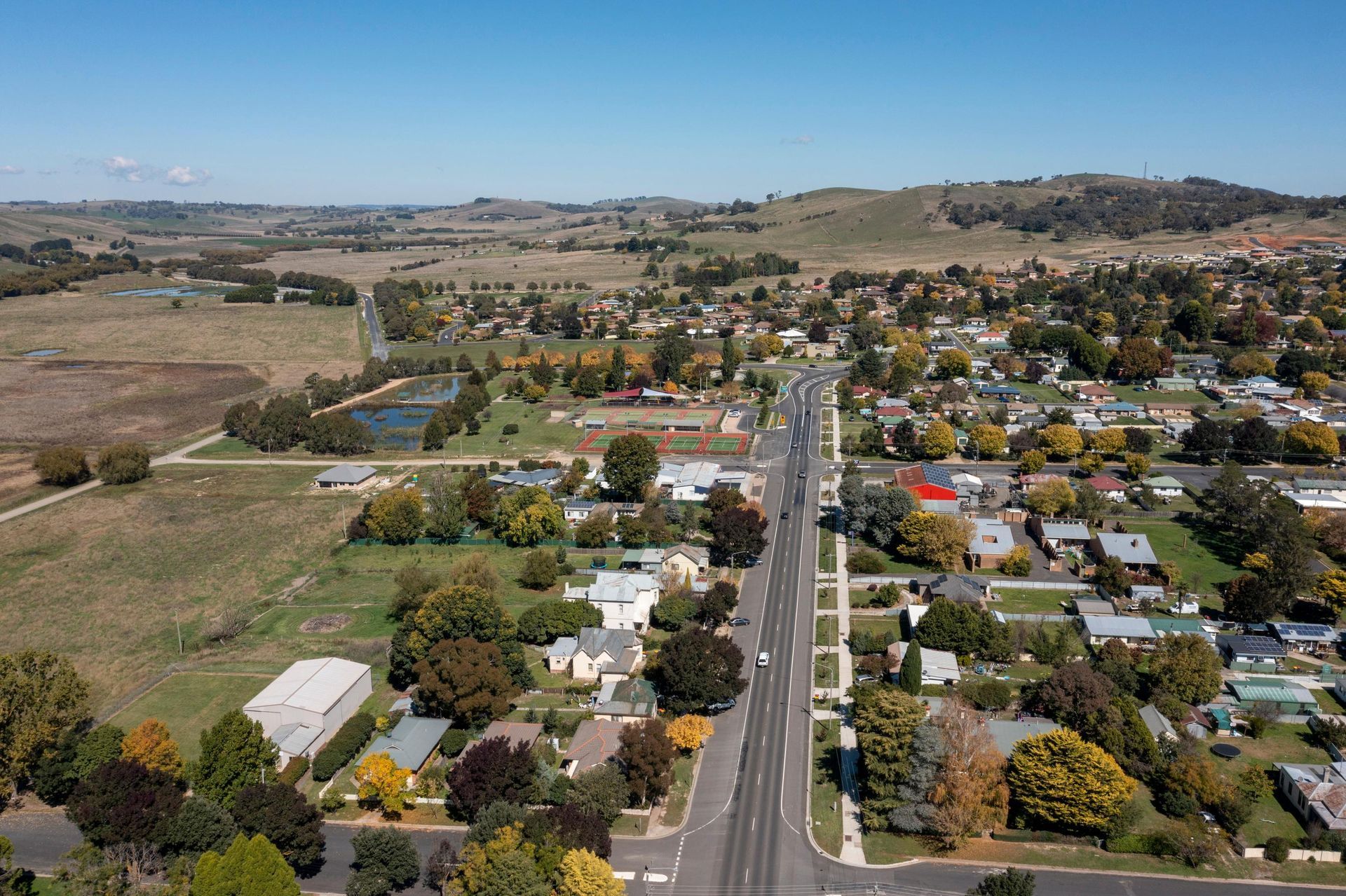 An Aerial View of a Small Town Surrounded by Trees and Fields — Active Cleaning Service Newcastle, NSW