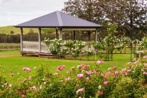 Gazebo in the Middle of a Lush Green Field — Active Cleaning Service Raymond Terrace, NSW.