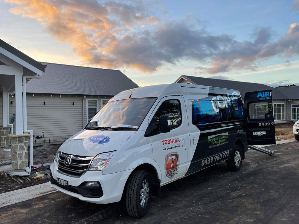 Transportation Van Side View — Aircon Mid North Coast in Kempsey, NSW