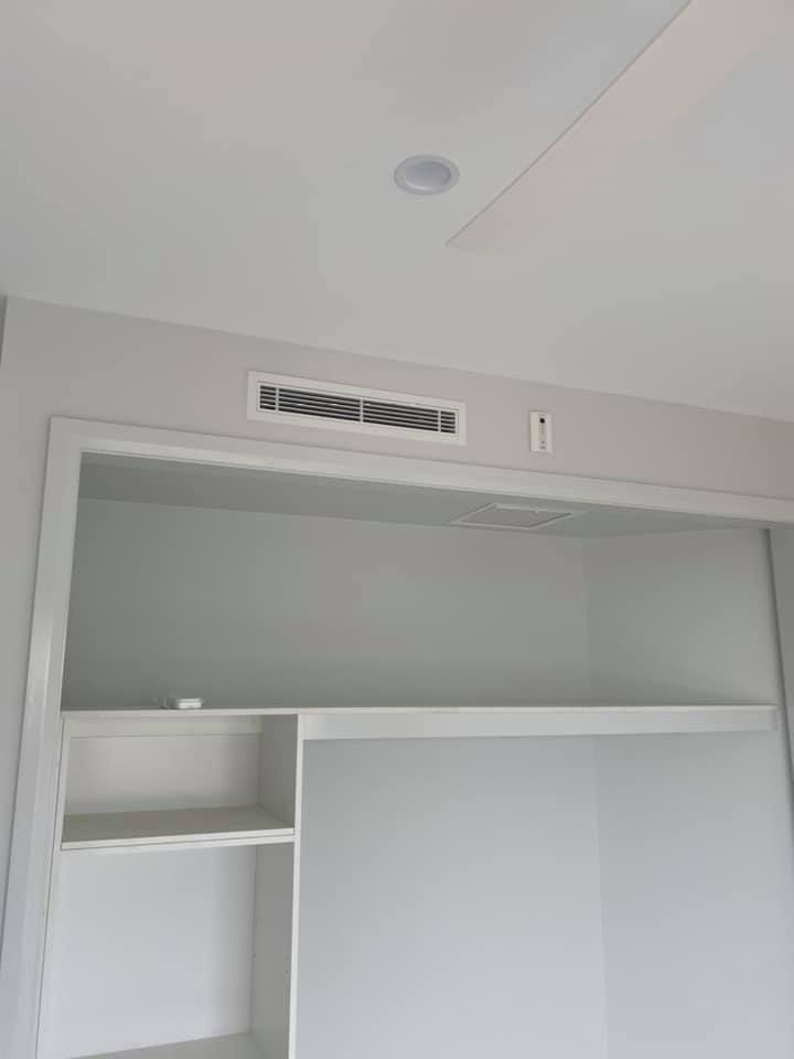 White Cabinet Against Ceiling in Stylish Interior — Air Conditioning Electricians in Forster NSW