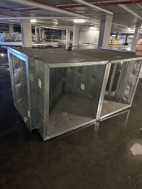 A Ceiling With A Lot Of Lights Hanging From It — Aircon Mid North Coast in Coffs Harbour, NSW