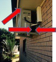 Air conditioner with red arrows — Air Conditioning Electricians in Forster NSW