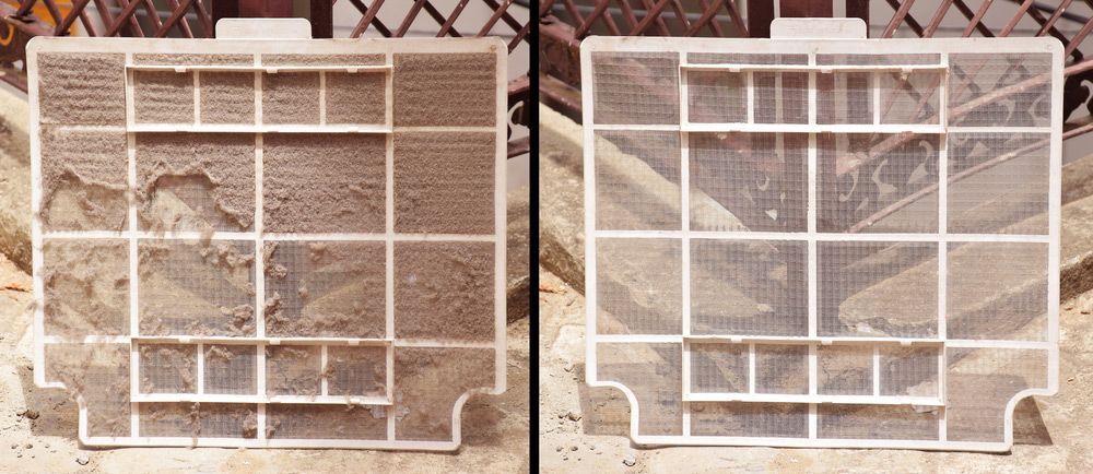 Two Air Filters, One Dirty and the Other Clean. the Dirty Filter is Caked With Dust