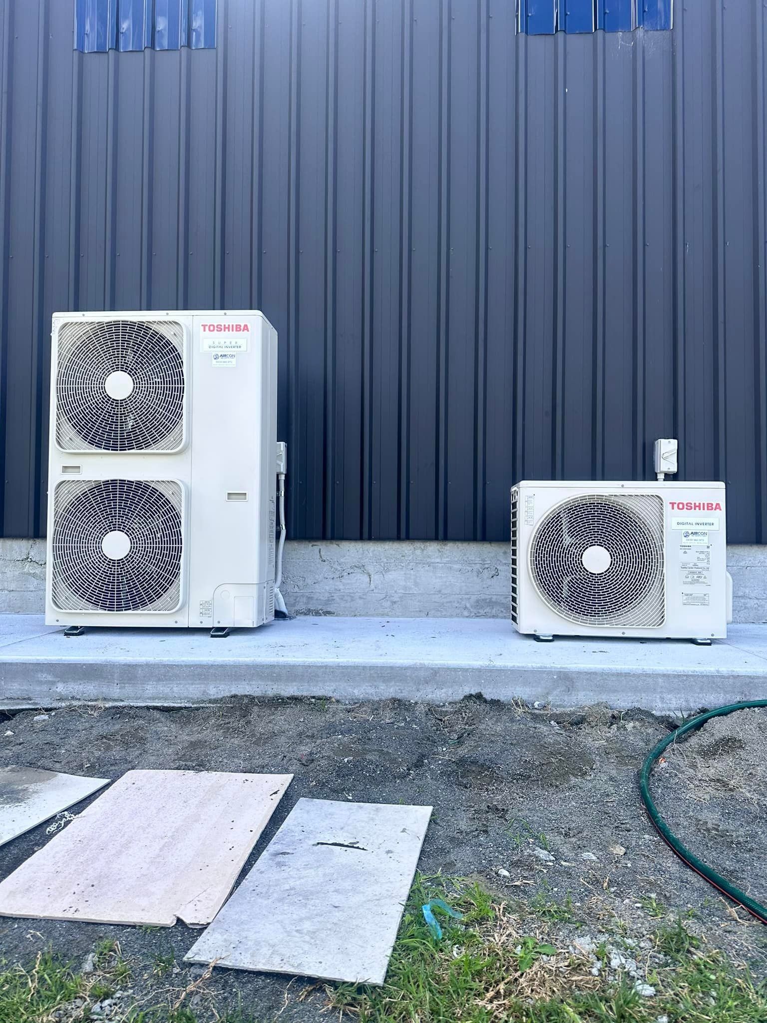 Two Outdoor Toshiba Air Conditioning