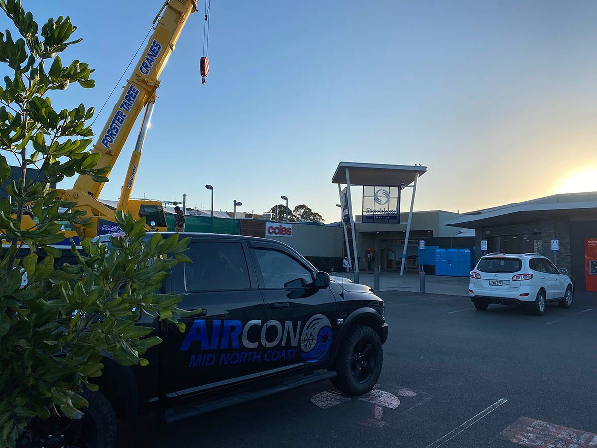 Crane And Car Outside The Mall — Aircon Mid North Coast in Forster, SW