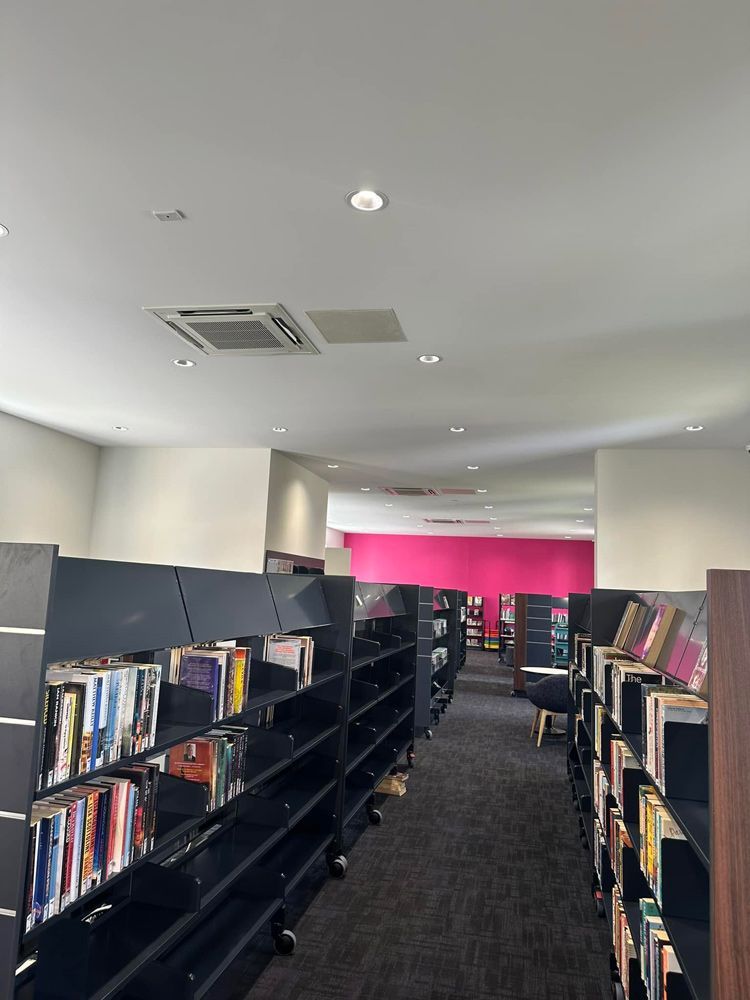 Ducted Air Conditioner in A Room Full of Books