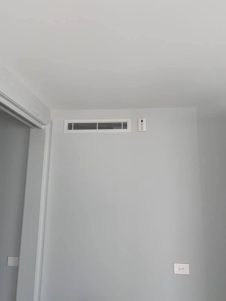 Ducted Air Conditioner on A White Wall