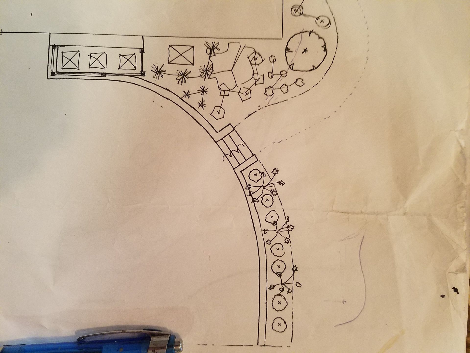 A black and white drawing on a piece of paper