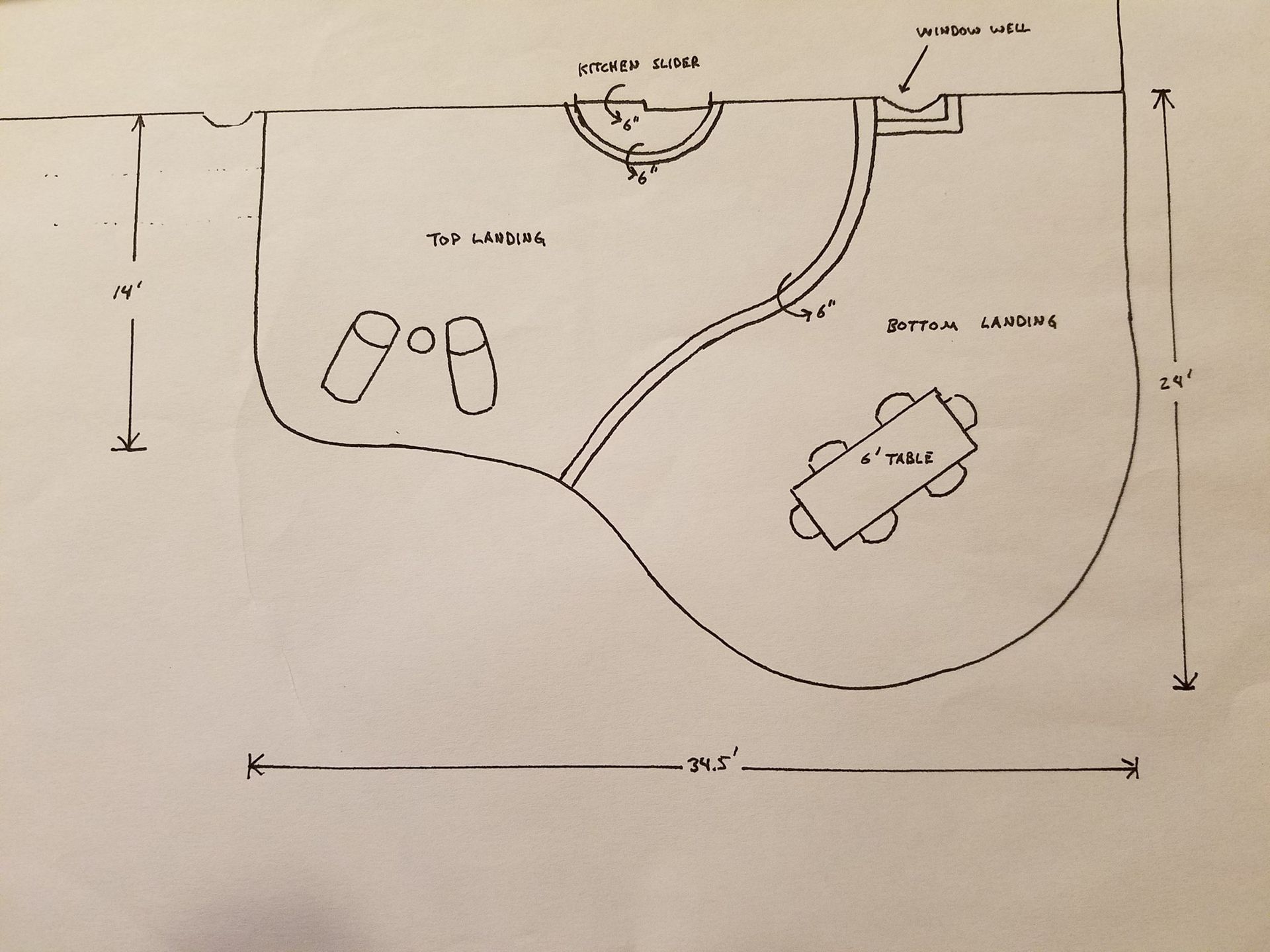 A black and white drawing of a room with measurements