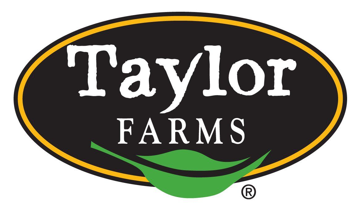 The logo for taylor farms is a black oval with a green leaf on it.