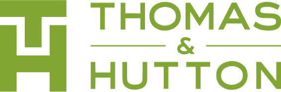 The logo for thomas and hutton is green and white.