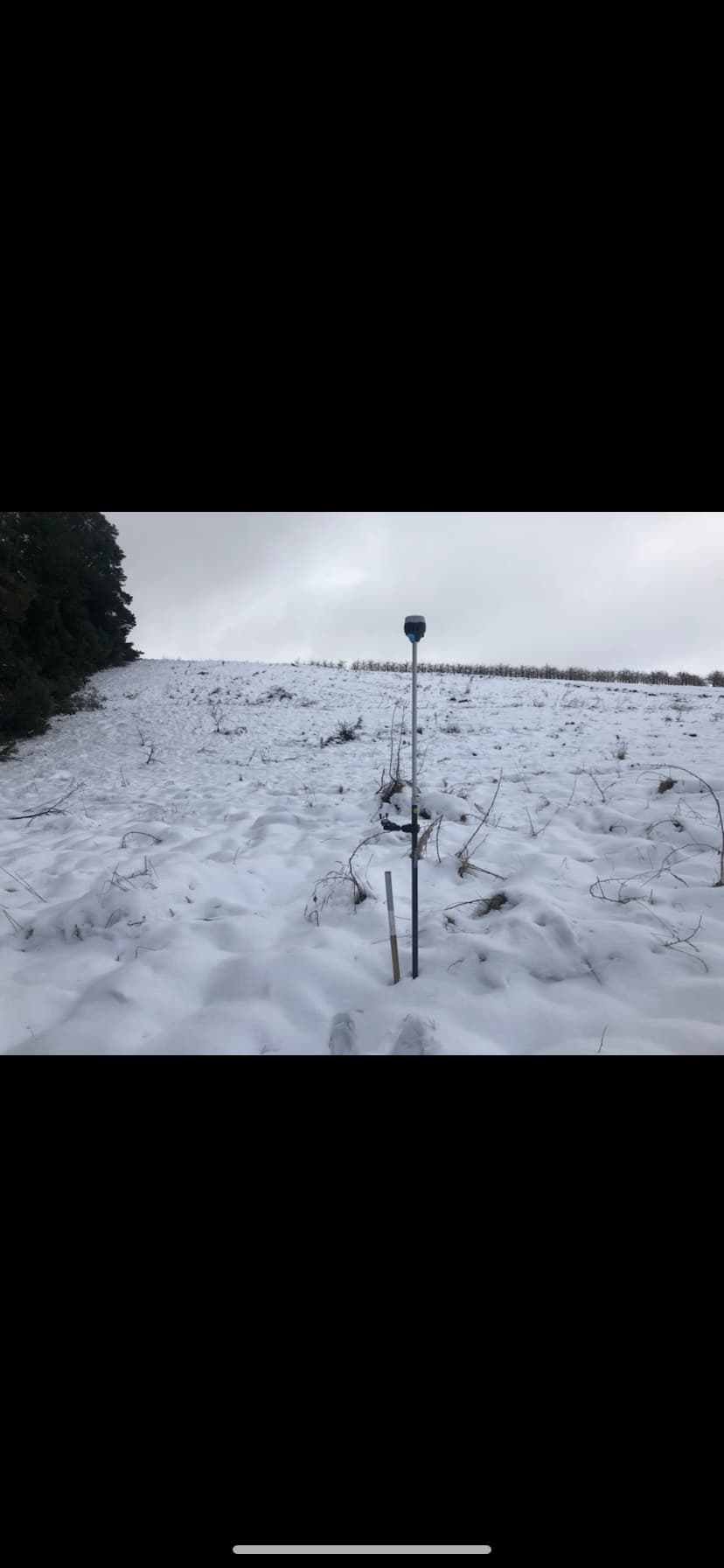 Pole in Snowy Field — Central West Power Construction in Orange, NSW