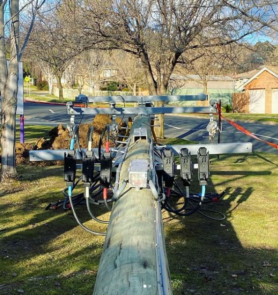 Powerline Pole Laying on the Ground — Central West Power Construction in Orange, NSW
