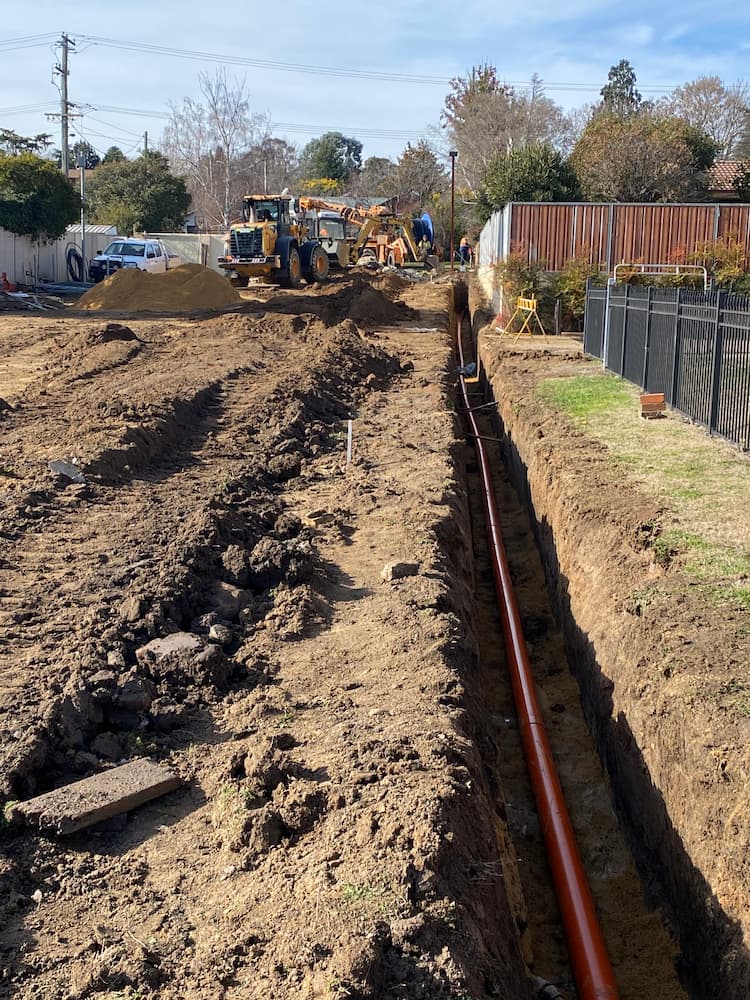 Installing Electrical  Pipeline Underground — Central West Power Construction in Orange, NSW