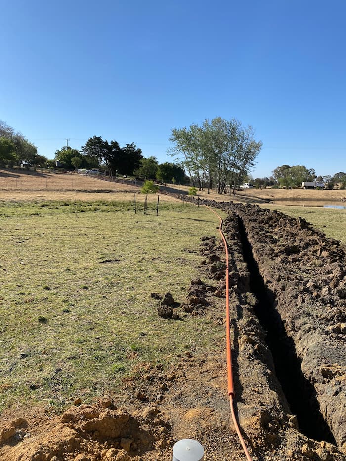 Pipes Beside the Excavated Ground  — Central West Power Construction in Orange, NSW