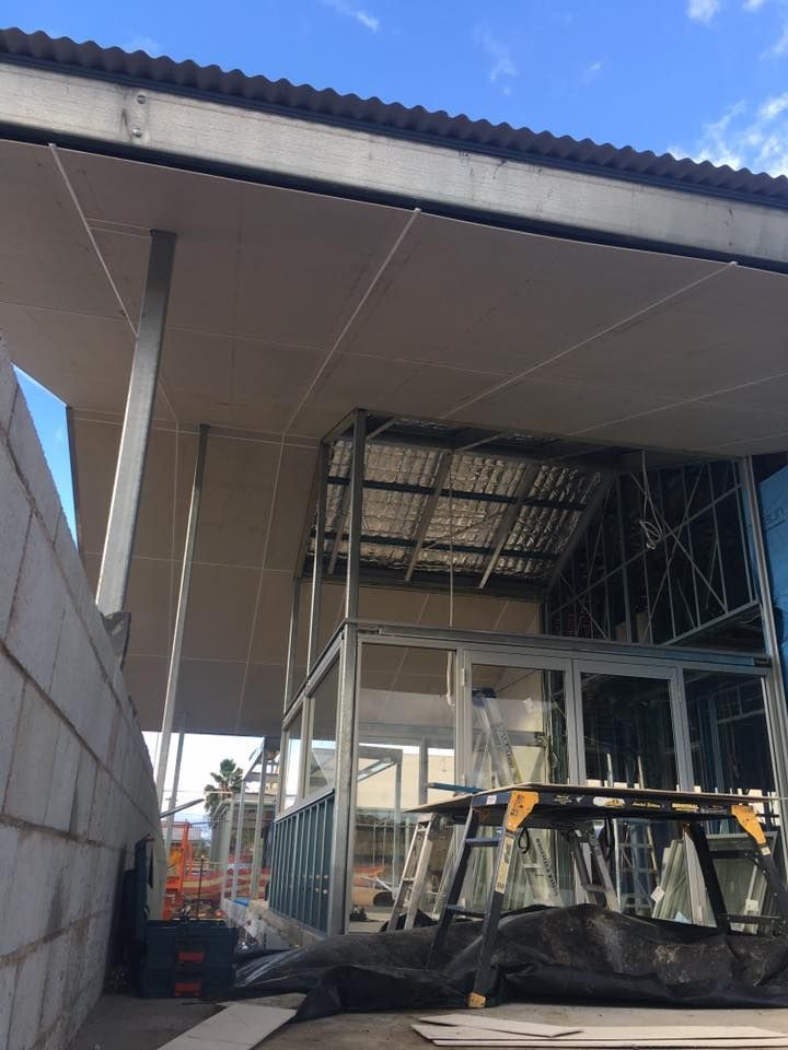 A Building Under Construction With a Blue Sky in the Background — LVL Constructions in Newcastle, NSW