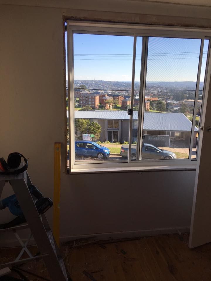 A Room With a Ladder and a Window With a View of a City — LVL Constructions in Newcastle, NSW