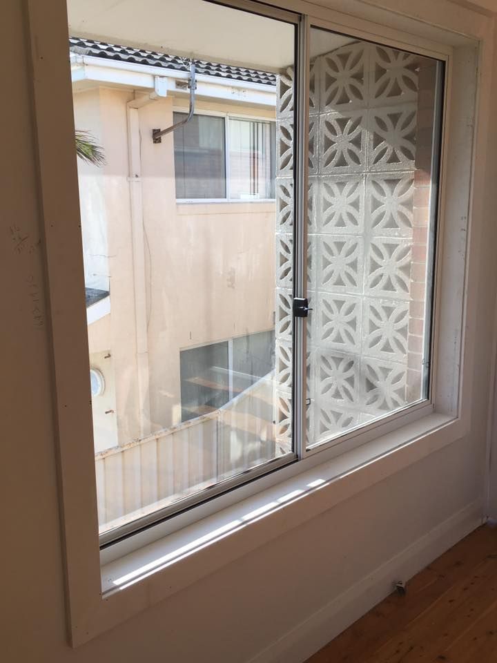 A Window in a Room With a View of a Building — LVL Constructions in Newcastle, NSW