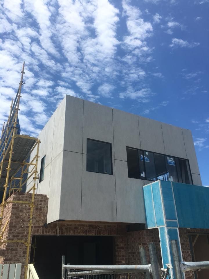 A Building Under Construction With a Blue Sky in the Background — LVL Constructions in Newcastle, NSW
