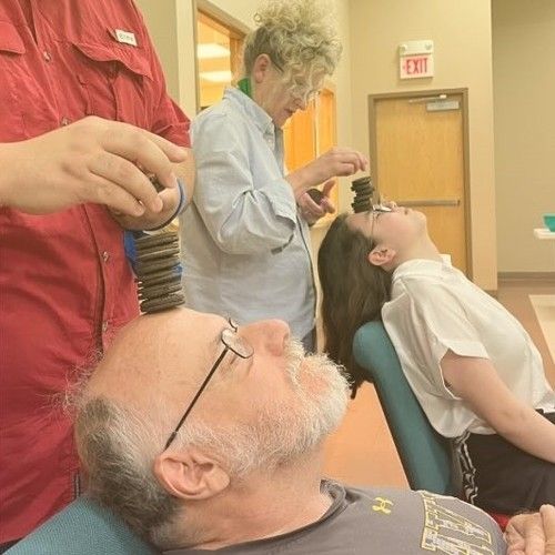 A Game of Balancing Cookies on the Head From Fairview Church of Christ's Summer Games Event