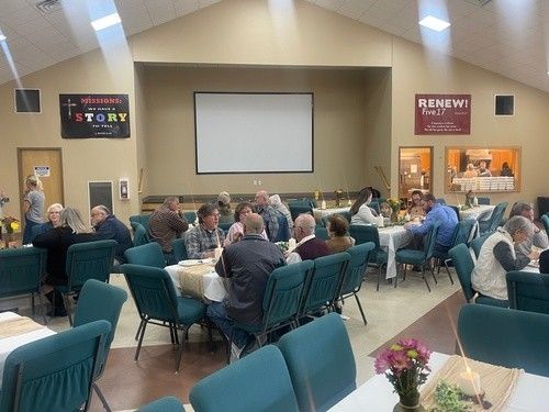 Tables of People Filled at Fairview Church of Christ's Thanksgiving Community Dinner in Columbia