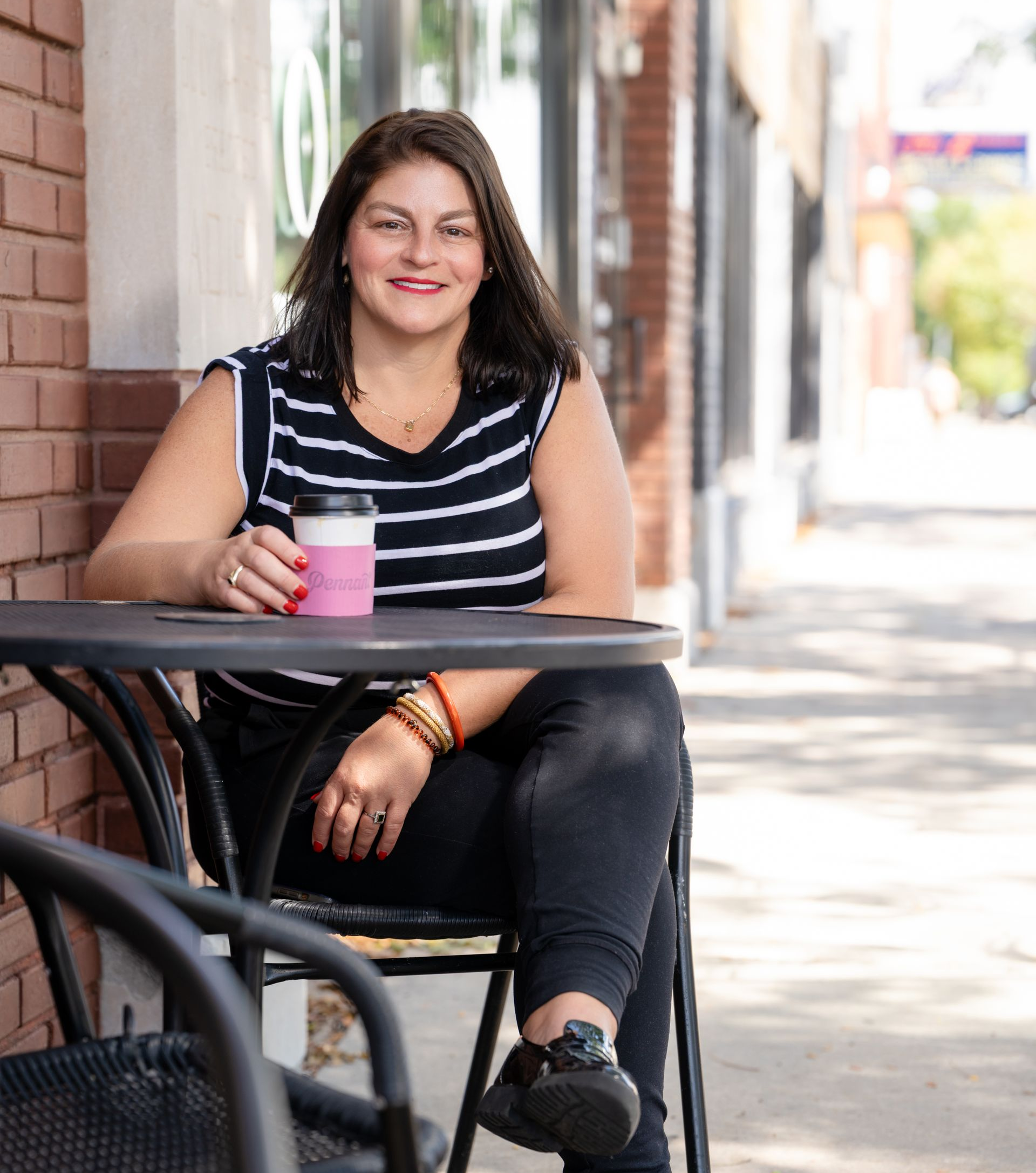 Maggie Ballard and her son Paxton standing in front of Paxton’s Blessings Box.