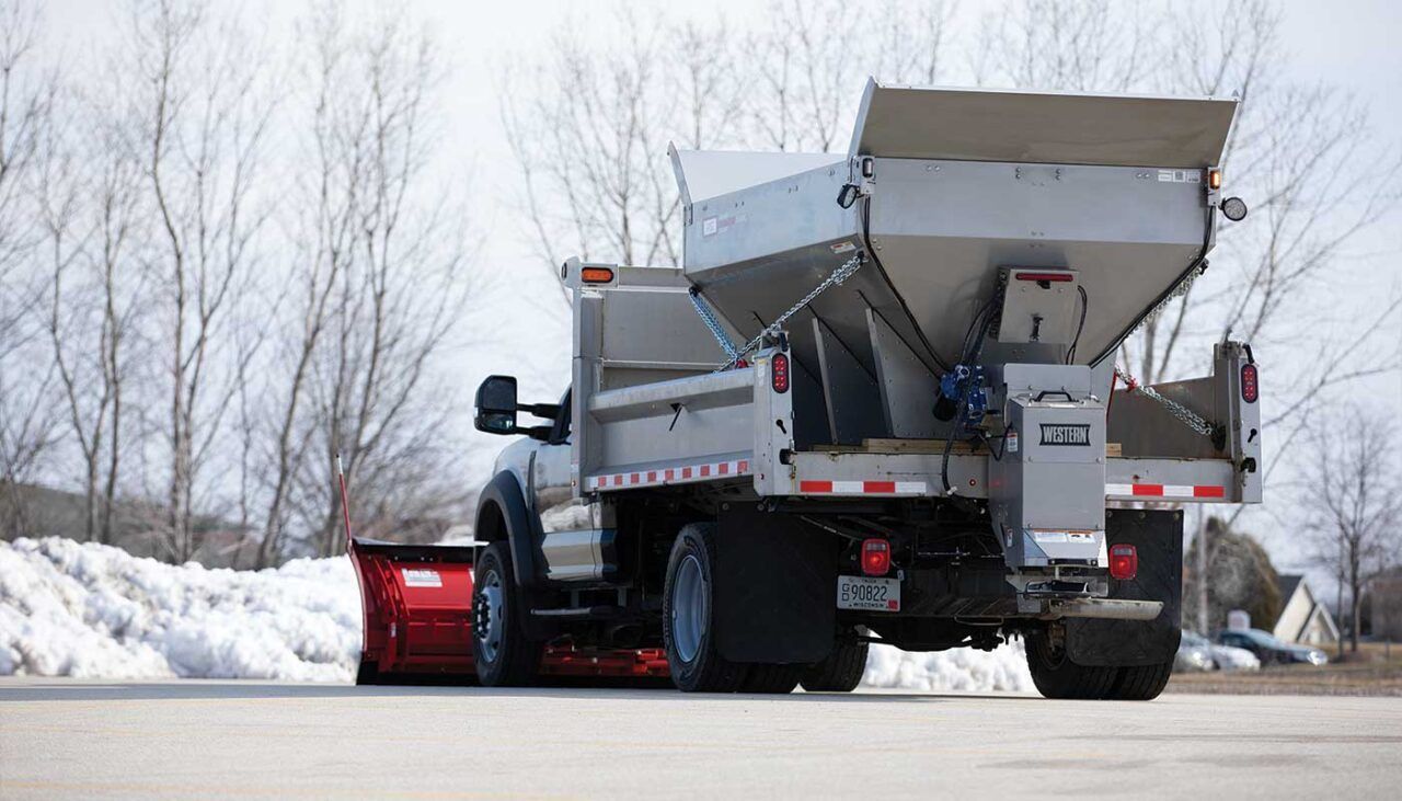 White Truck Spreading Salt — Destin, FL — Destin Discount Granite And Cabinets