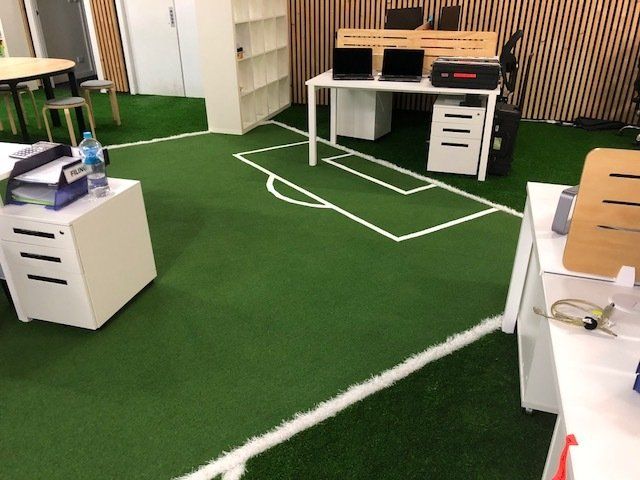 office with artificial grass flooring