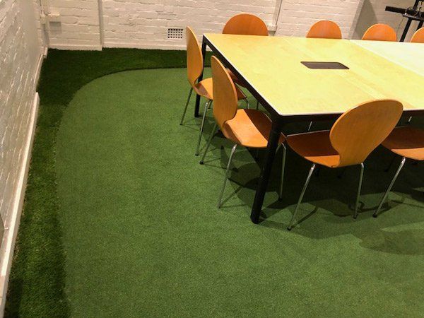 meeting room with artificial grass flooring