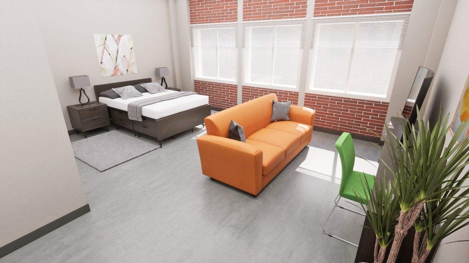 Bedroom with bed, orange couch, desk, and large windows.
