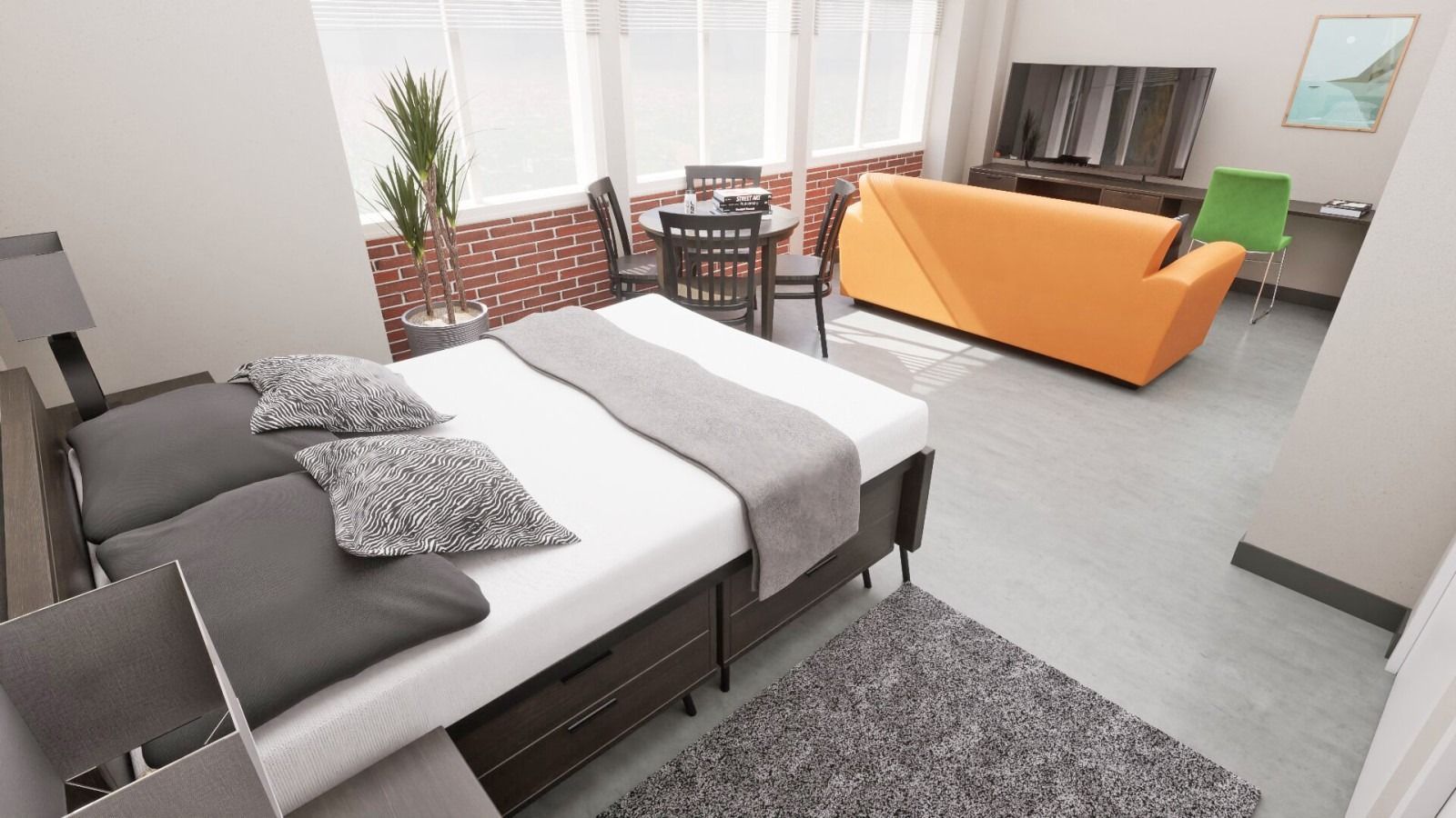 Bedroom and living area with bed, orange couch, dining table, and rug.