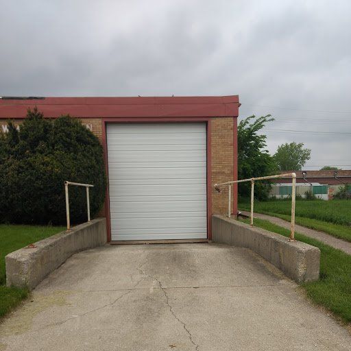 Commercial building with luxury cars inside