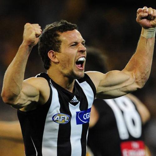 Luke Ball wearing a Collingwood jersey celebrates a goal!