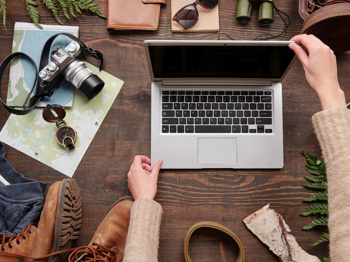 person is using laptop to determine how to sell the business after divorce.