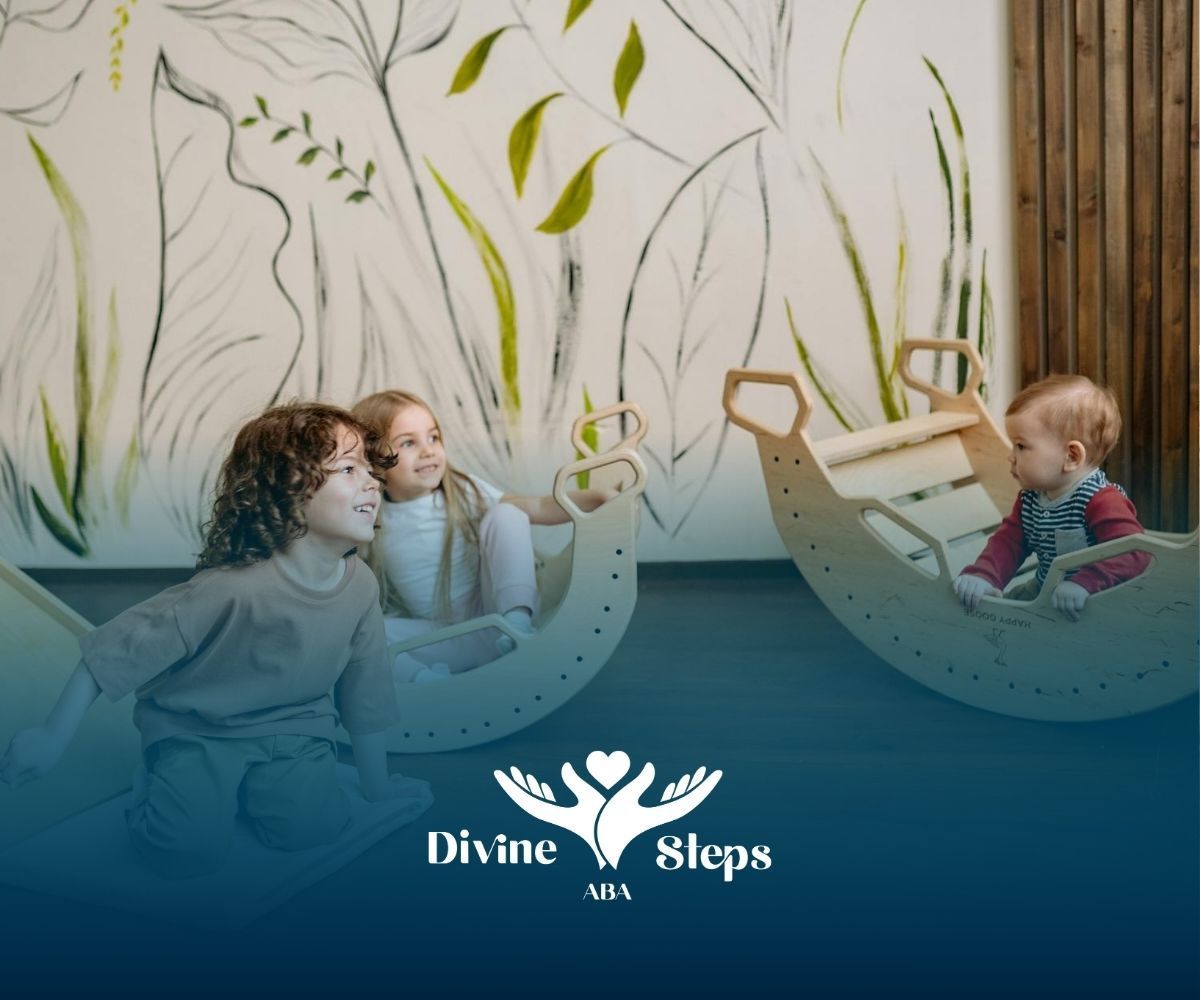 Three autistic children playing on wooden rocking toys in a room during ABA therapy in Virginia.