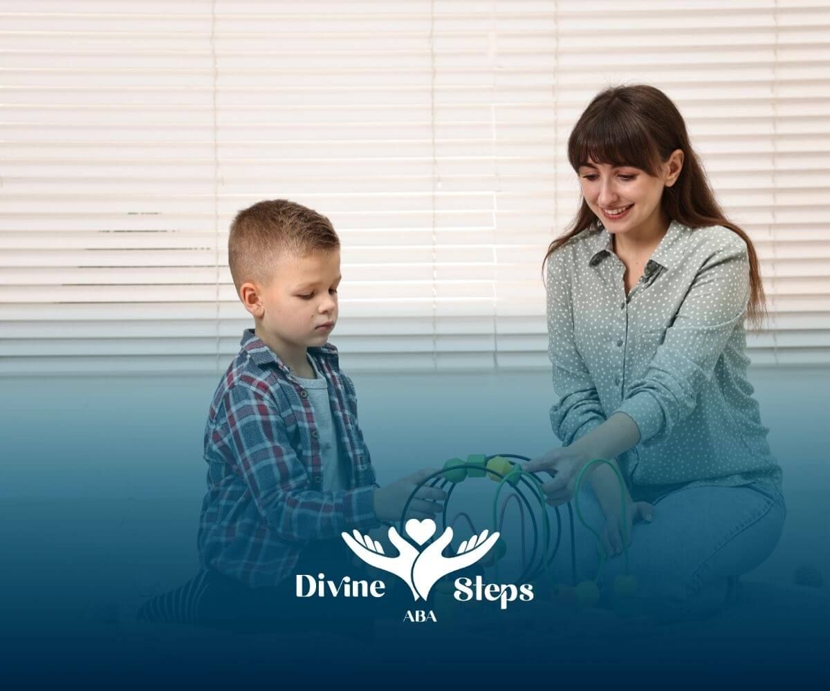 A therapist & child using bead maze toy to practice focus, turn taking, & developmental play skills.