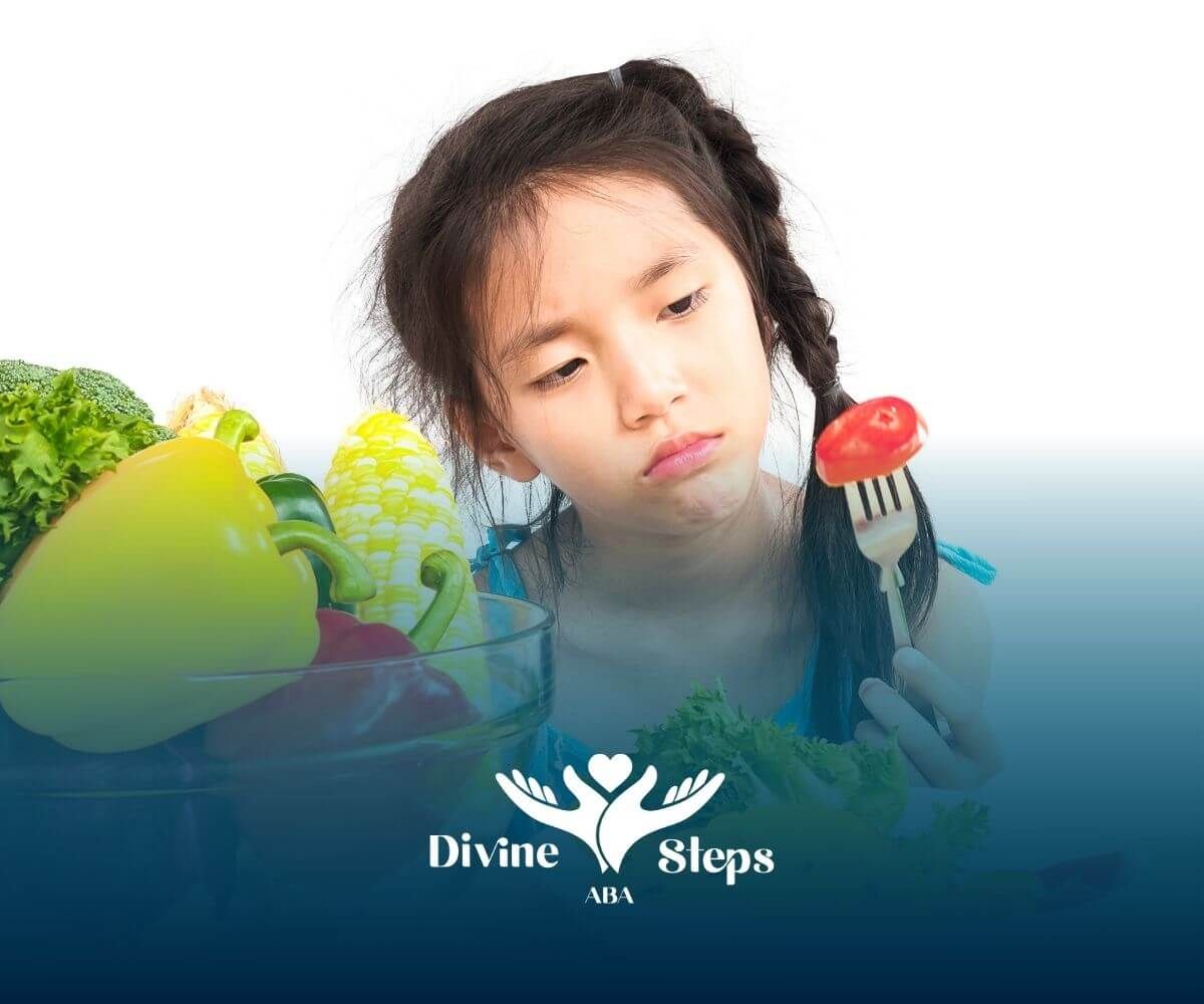 An autistic girl looking uncertain while holding a tomato near vegetables, showing selective eating