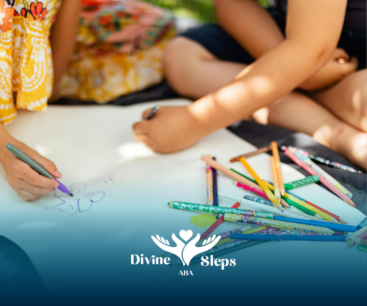 Children drawing with colored pencils on paper at a table