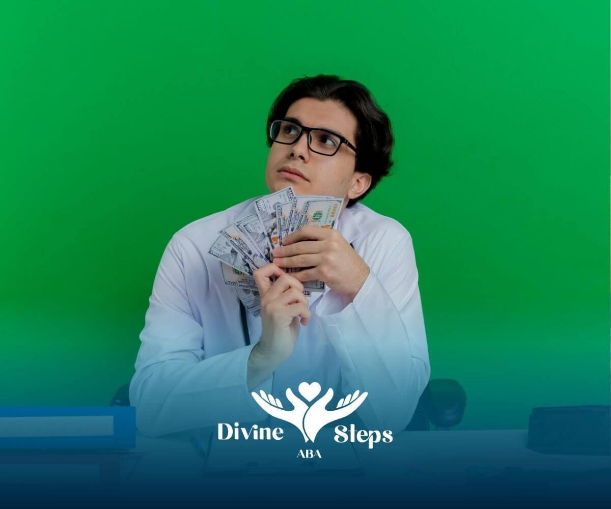 ABA Therapist holding cash at desk, representing behavioral therapist salary and earnings discussion