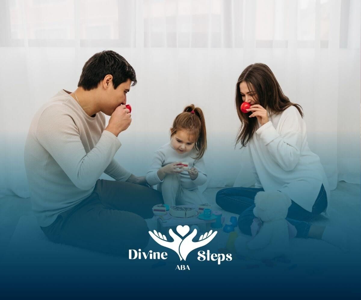 A family is sitting on the floor playing with toys while waiting for ABA therapy to start.