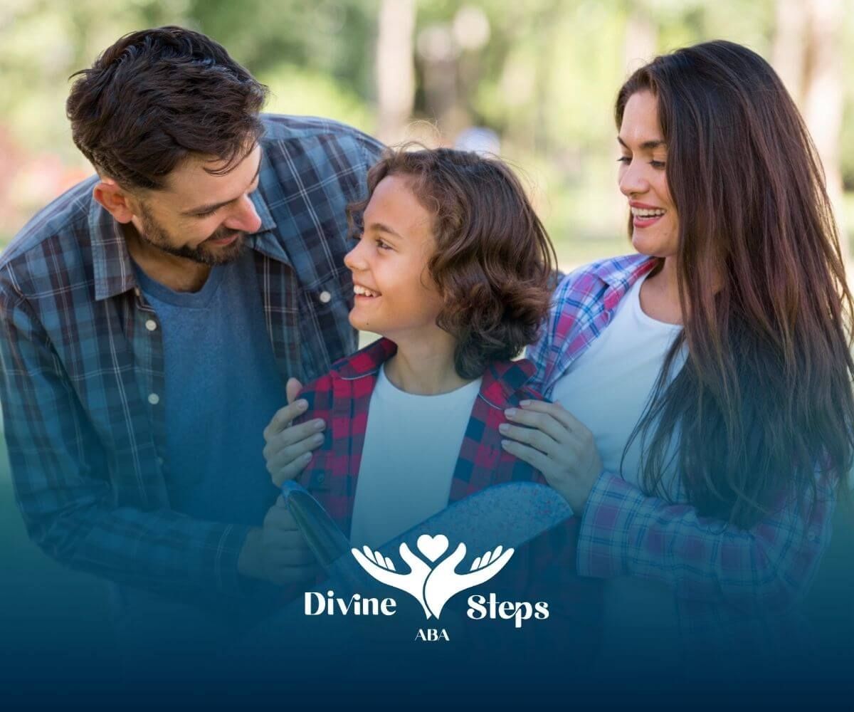 A family is standing next to each other in a park after attending ABA therapy.